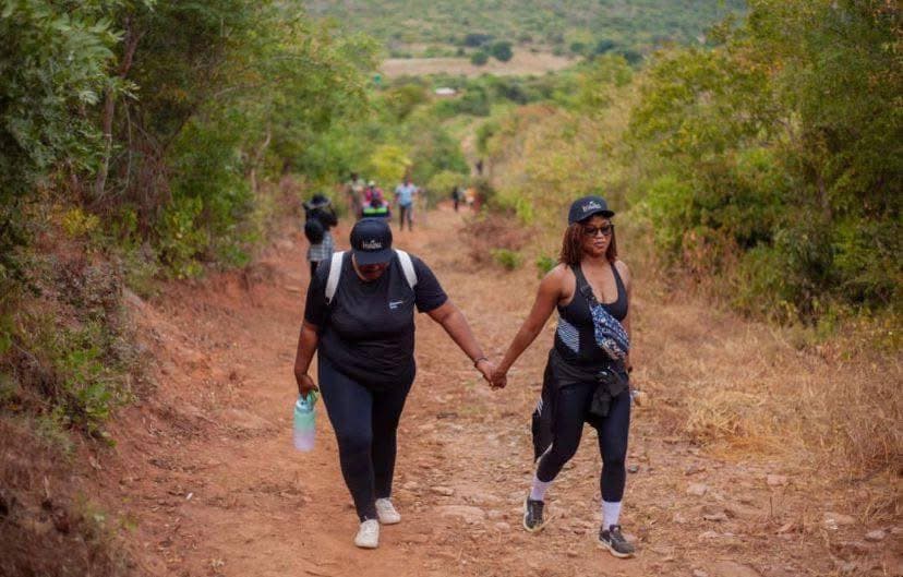 La'gullez travelers hiking together